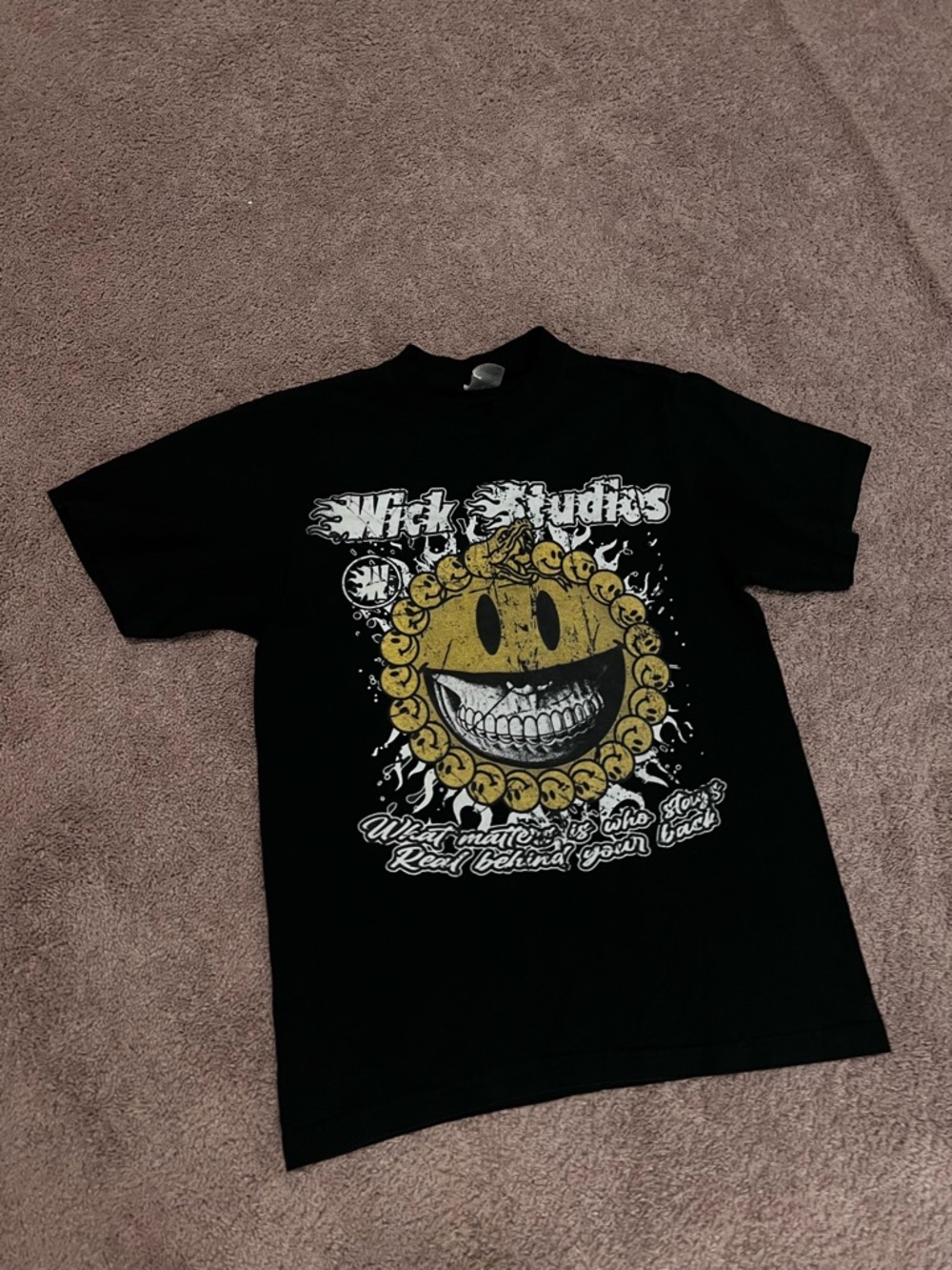 Black Short Sleeve Tee with Distressed Yellow Smiley Graphic